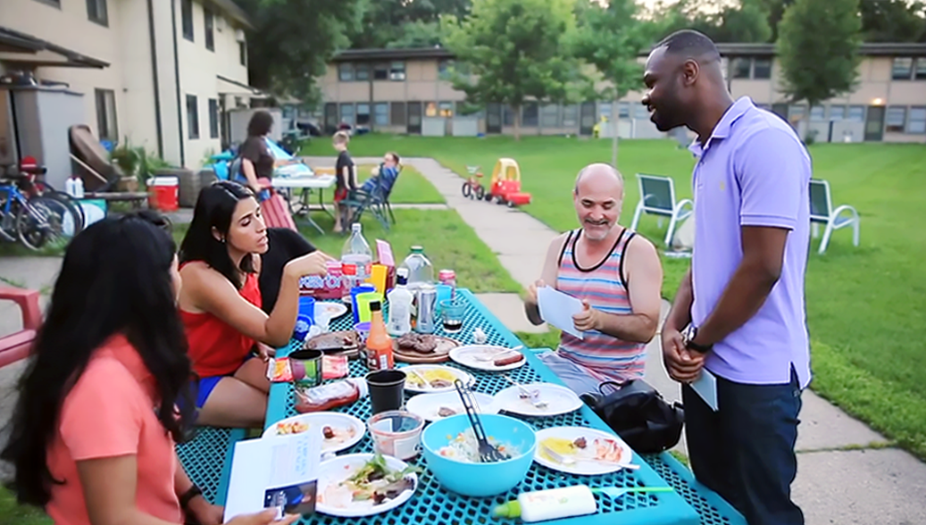 Yakasah talking with CTC neighbors