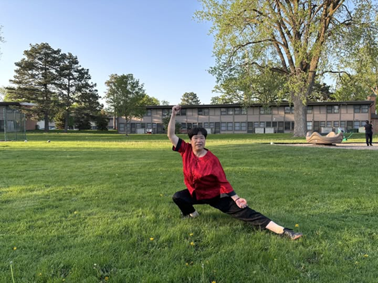 Ms. Ying practicing Tai Chi outside CTC housing